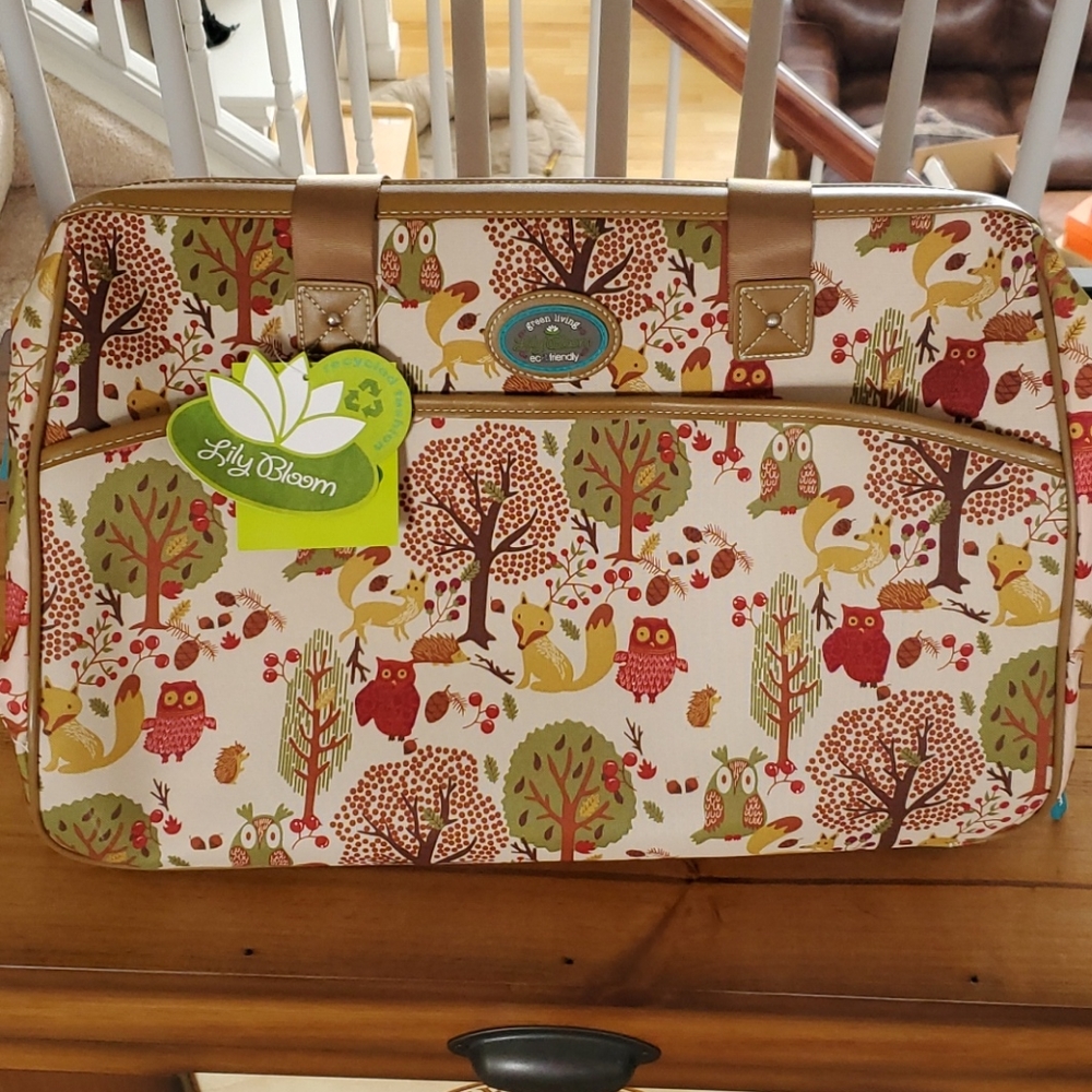 Lily Bloom rolling duffle bag